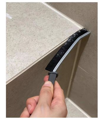 Cepillo de limpieza de hendiduras negro con cerdas duras para limpieza profunda de esquinas difíciles de alcanzar