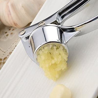 135G Manual de cocina Presión de ajo Triturador de jengibre Triturador de pelar Exprimir Chopper Gadget