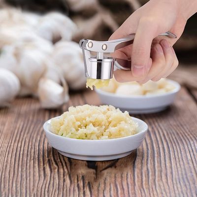 135G Manual de cocina Presión de ajo Triturador de jengibre Triturador de pelar Exprimir Chopper Gadget
