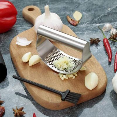 Grateadora de cocina múltiple 120G caja de colores 141G Triturador y triturador de ajo para exprimir fácilmente