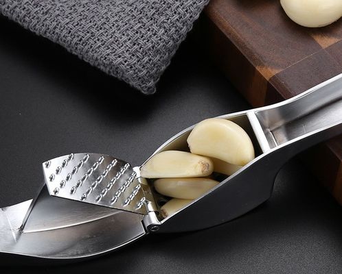 Grado alimenticio Presión de ajo, trituradora de jengibre, exfoliante, exprimidora de 16*3cm, rebarba de cocina múltiple