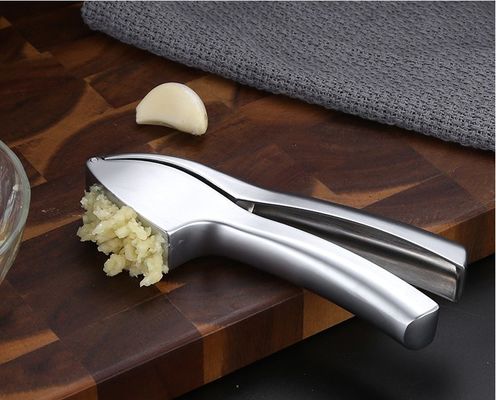 Grado alimenticio Presión de ajo, trituradora de jengibre, exfoliante, exprimidora de 16*3cm, rebarba de cocina múltiple