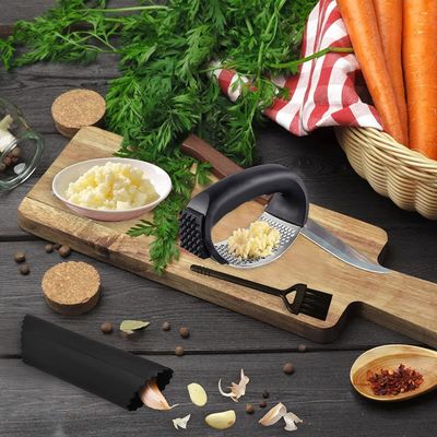 Prensa de ajo de acero inoxidable de grado alimenticio