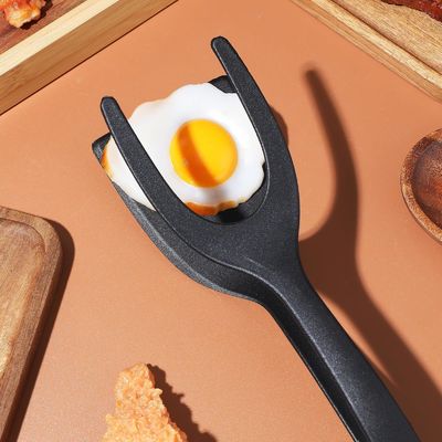 2 en 1 espátula Tong para herramienta de cocina huevo negro aletas Tong panqueques pescado tostadas francesas