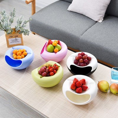 Maximice el tiempo de aperitivos con este contenedor de frutas secas de doble capa y porta teléfonos
