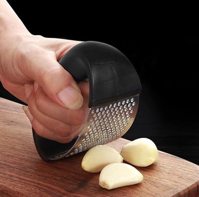 Mejor vendedor de prensa de ajo caliente pelador manual de acero inoxidable para herramientas de frutas y verduras