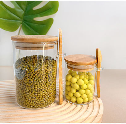 Contenedor de almacenamiento de alimentos de cristal transparente con diseño funcional y tapa redonda de bambú