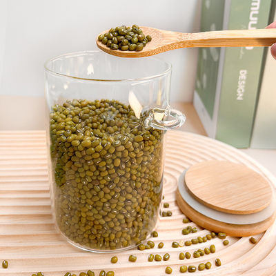 Comida Botellas redondas de vidrio de bambú con tapa y cuchara Caramelos Especias Caffé Frijoles Nueces Galletas