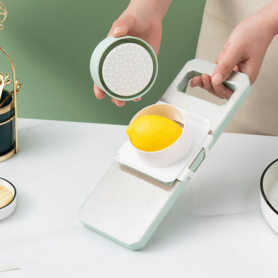 Cortador de verduras de acero inoxidable verde menta perfecto para la preparación rápida y fácil de las comidas