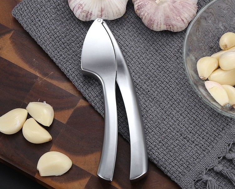 Grado alimenticio Presión de ajo, trituradora de jengibre, exfoliante, exprimidora de 16*3cm, rebarba de cocina múltiple